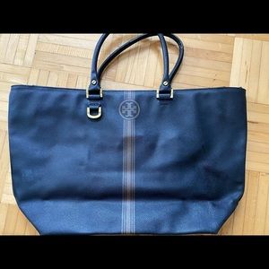 Tory Burch black leather with gold finish top handle handbag. Zipper enclosure